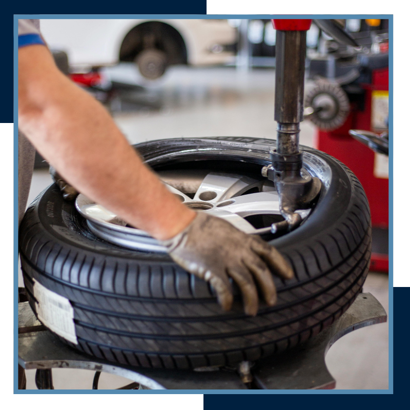 placing tire on wheel